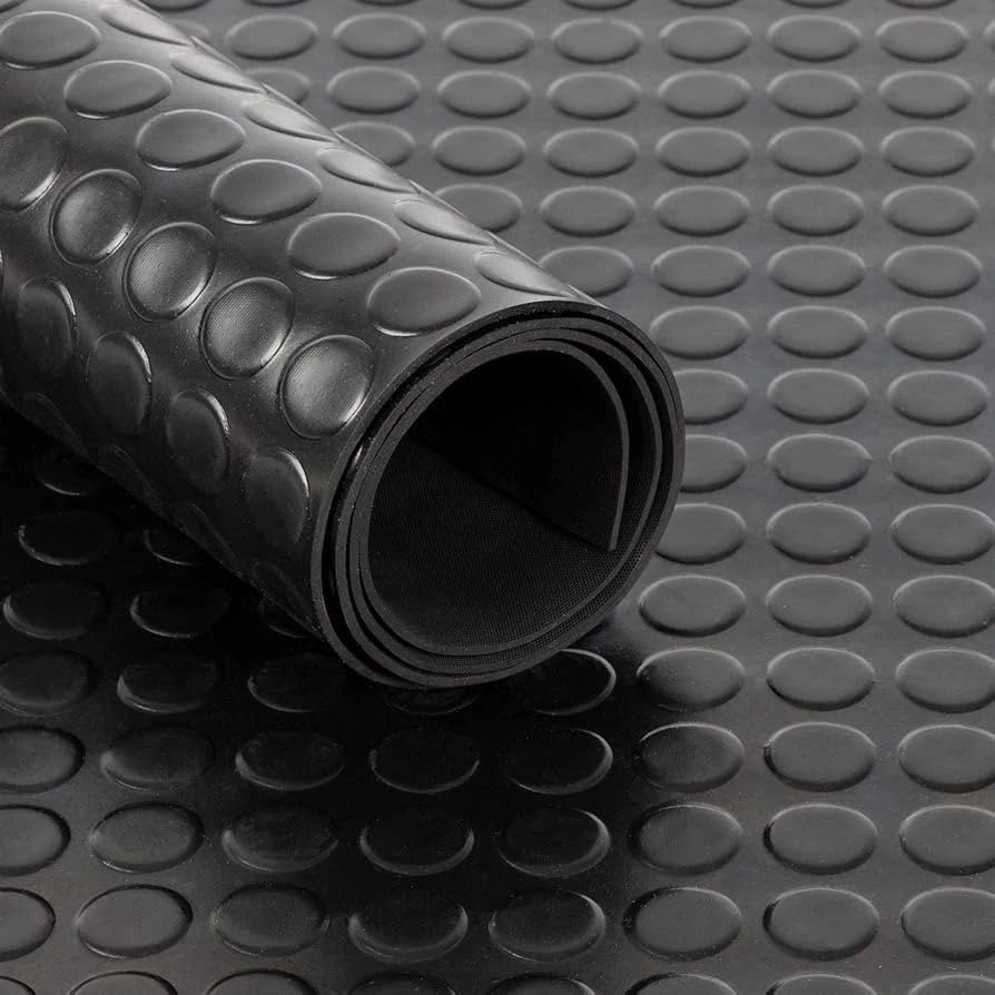 Rolled 4mm black rubber matting in coin tread with sheet laid out