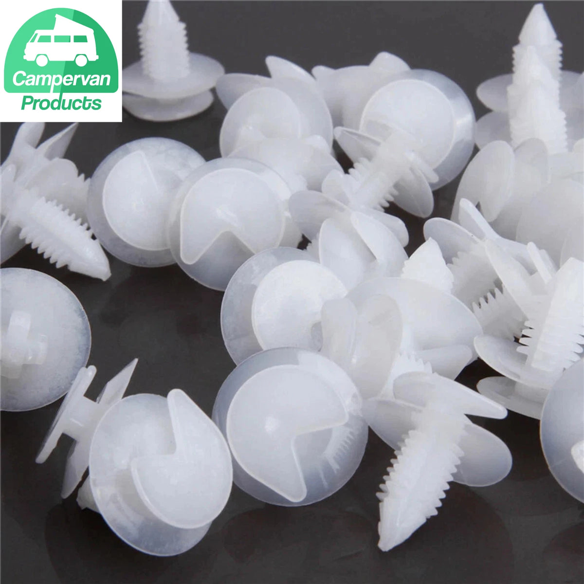 White hidden trim panel fixing clips showing round heads and ribbed stems