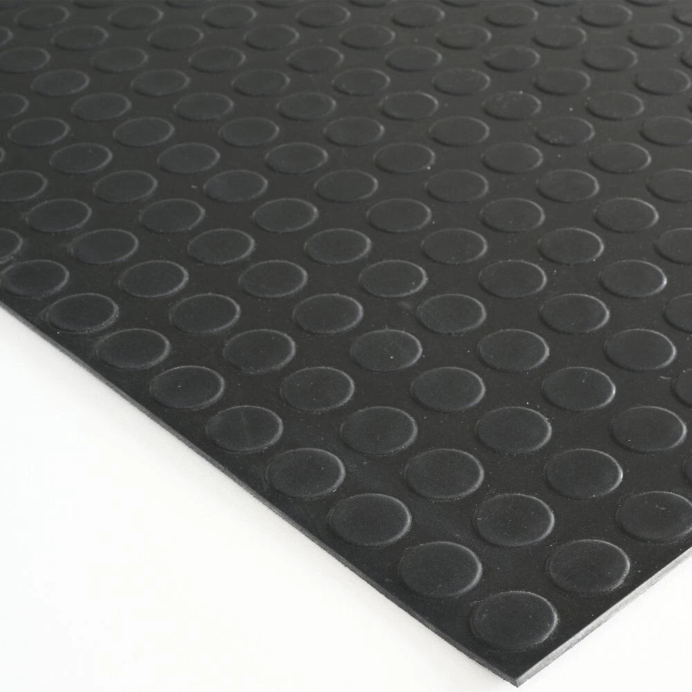 Cut black 3mm coin pattern rubber matting sheet and edge