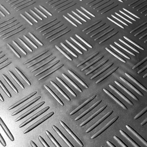 Close-up of black 5 bar rubber flooring tread