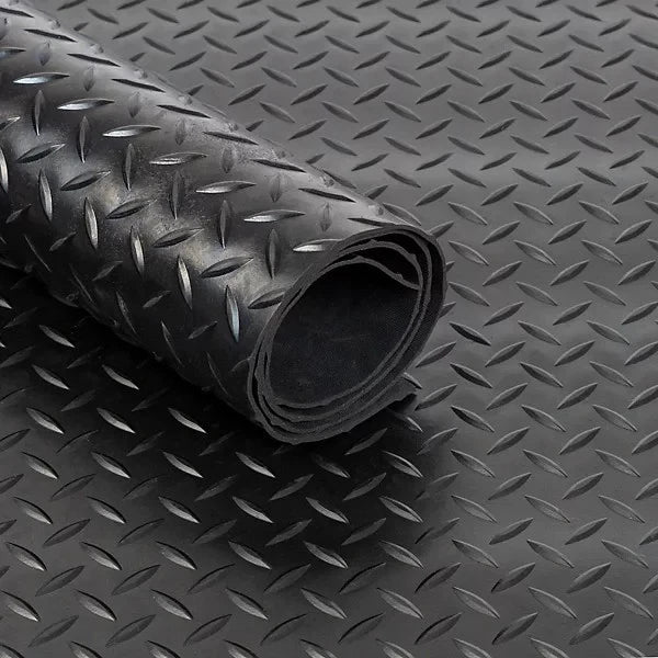 Rolled 4mm black rubber matting in chequer plate tread with sheet laid out