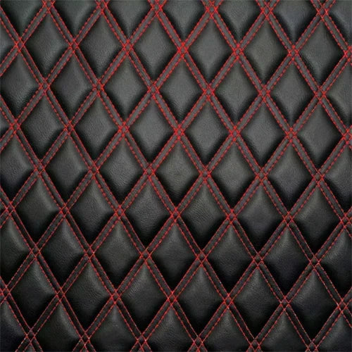 Dark double diamond upholstery with red stitching