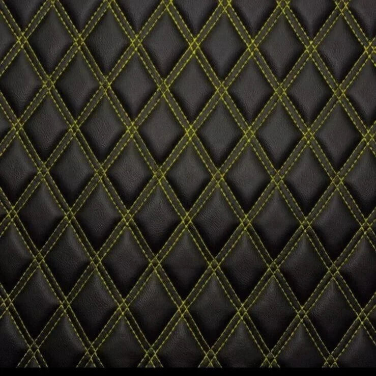 Dark double diamond upholstery with yellow stitching