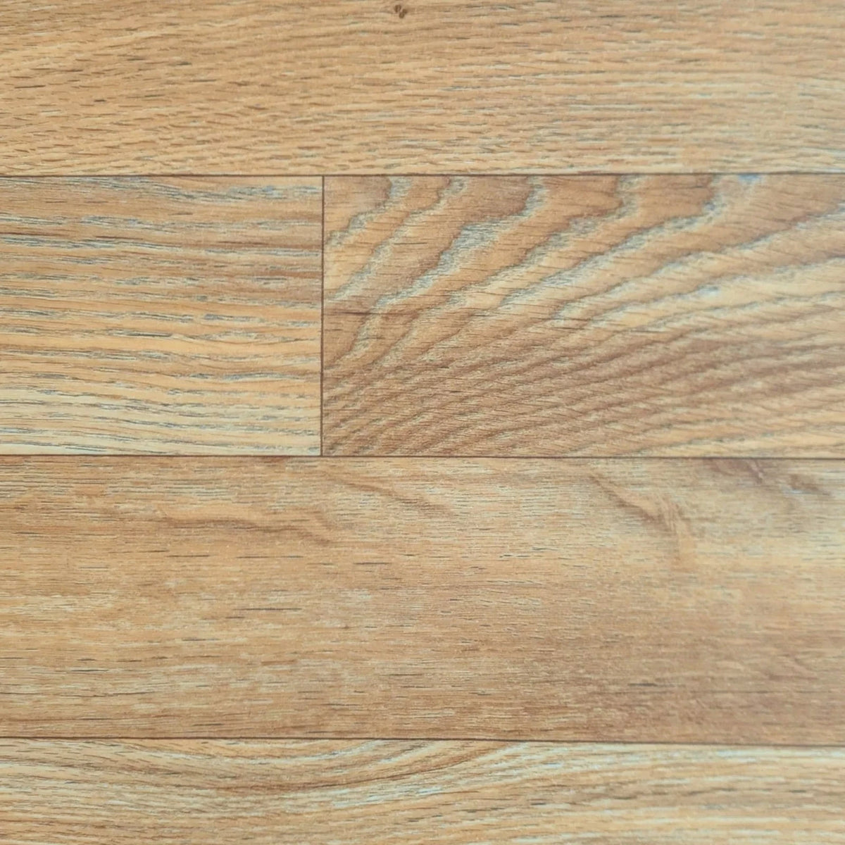 Golden brown wood-effect vinyl flooring showing the grain and plank pattern