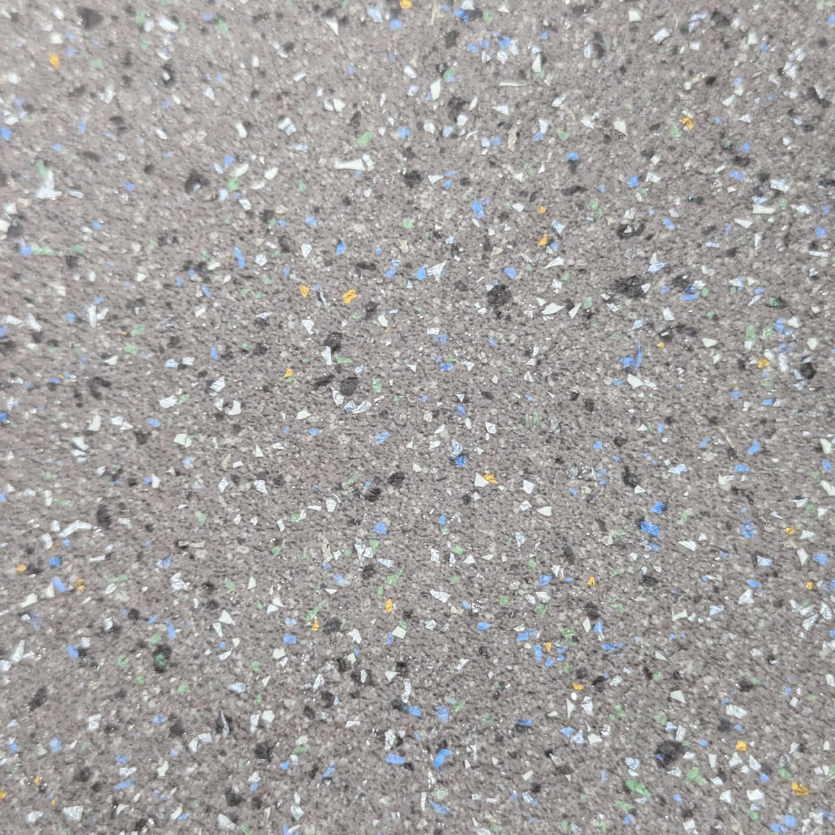 Light grey speckled vinyl close-up showing multicoloured flecks
