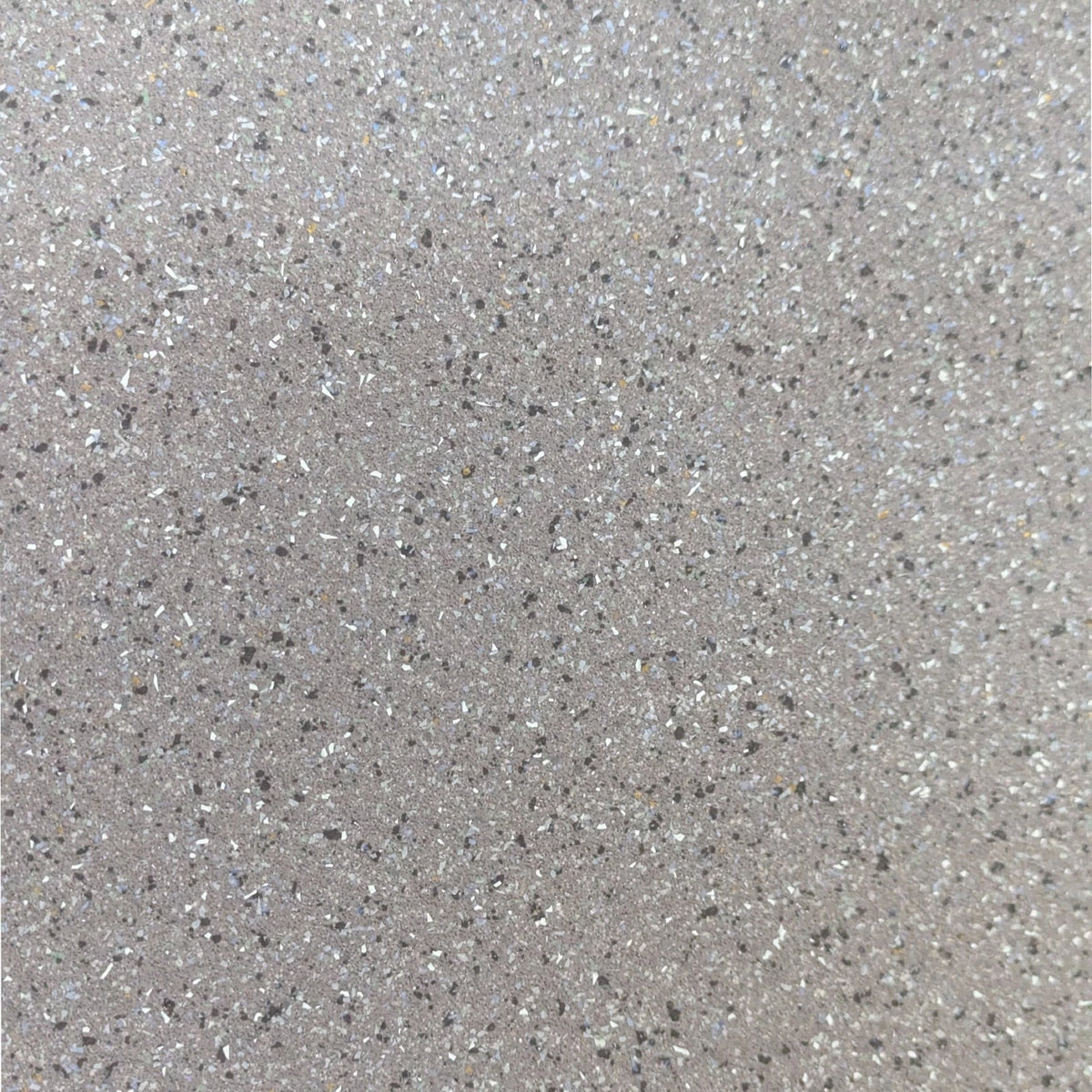 Light grey speckled vinyl flooring surface viewed from above