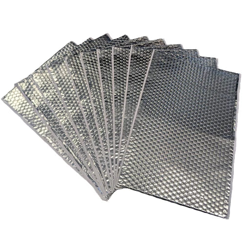 Sound deadening sheets fanned out to show their embossed aluminium faces