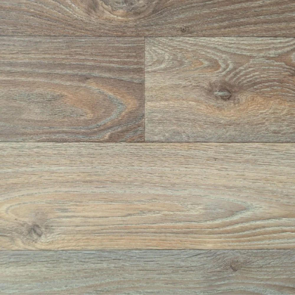 Wood-effect flooring close-up with knots and varied plank pattern