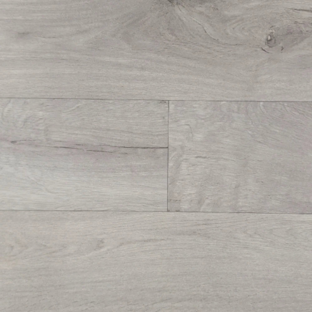 Light wood-effect flooring close-up showing grain and plank joins