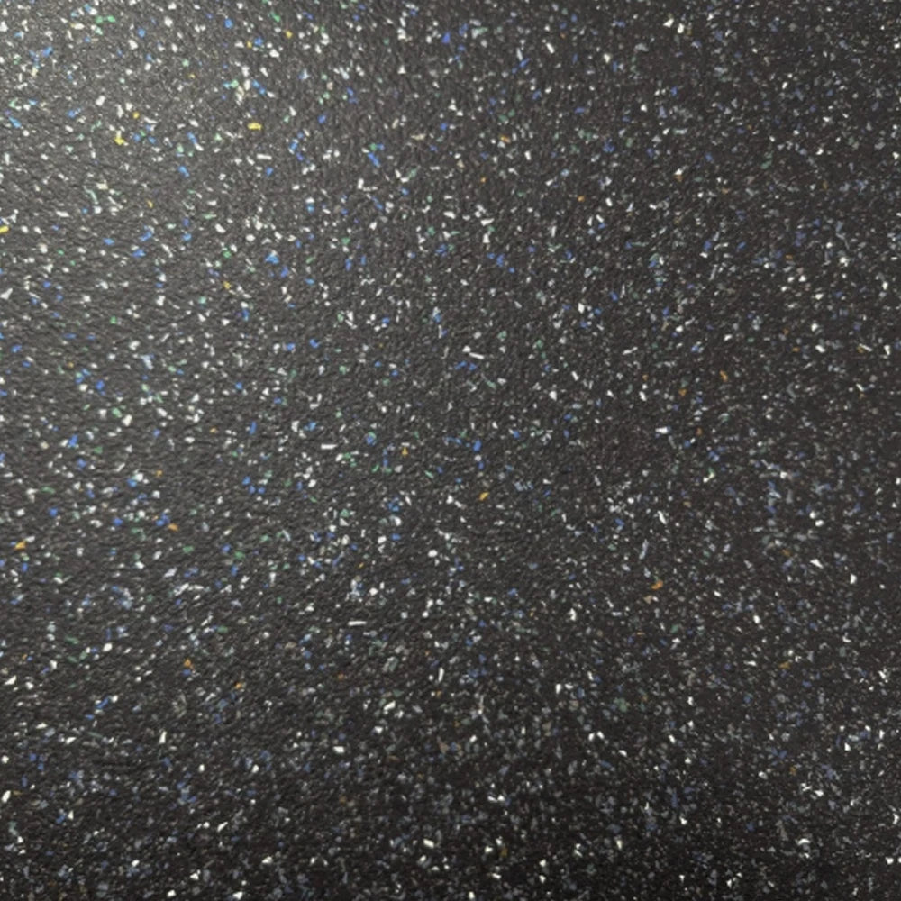 Black speckled vinyl flooring close-up with multicoloured flecks