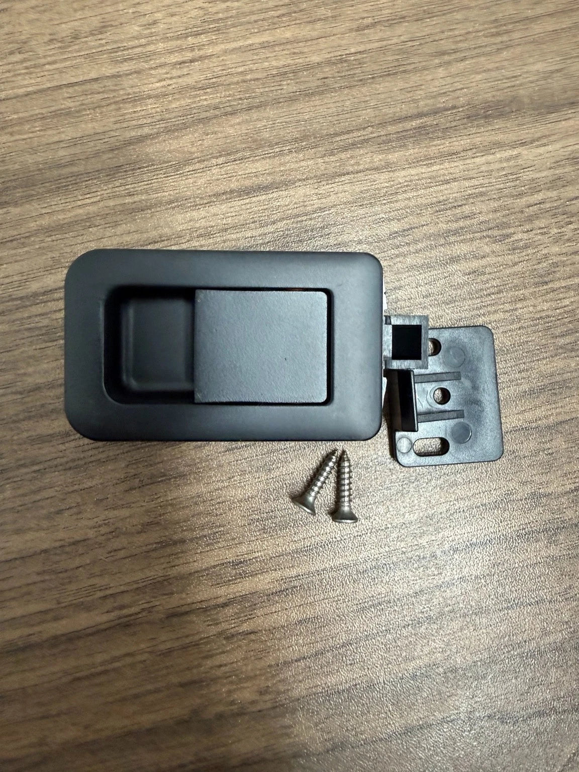 Black flush pull latch with strike plate and screws